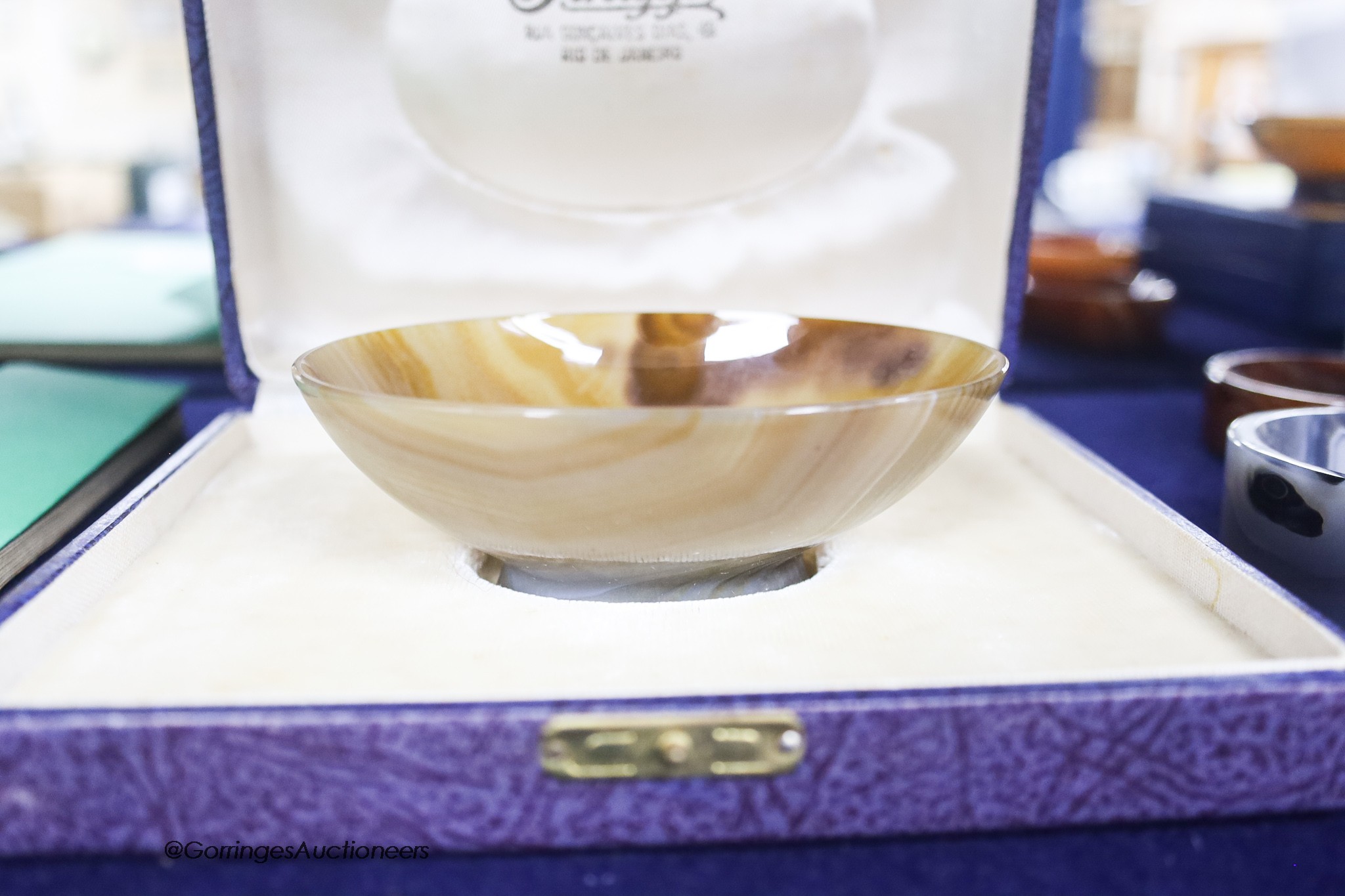 Two Chinese agate bowls, width 10cm and 4 other agate pieces